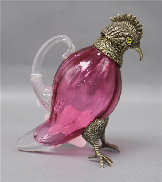 A novelty silver plate mounted cranberry glass bird liqueur jug H. 15cm.